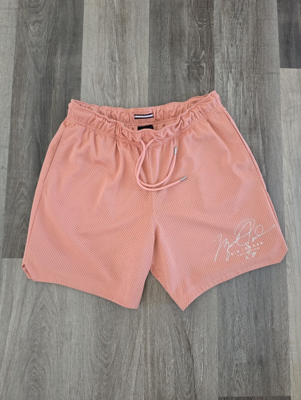 Jordan Peach Mesh Athletic Shorts with White Script Logo